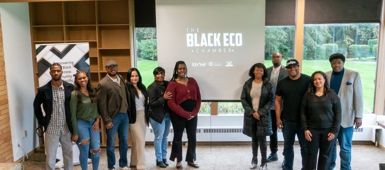 Attendees and hosts pose for a group photo at the Black Eco Chamber Starting a Business Workshop.