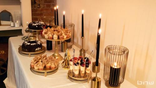 Dessert table at the BECO 2024 Holiday Mixer Event at The Bindery in Tacoma, WA. Photo by Larry Dominico for Brave New World Enterprises.