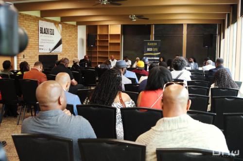 Attendees watch a panel at the 2024 BECO EXPO