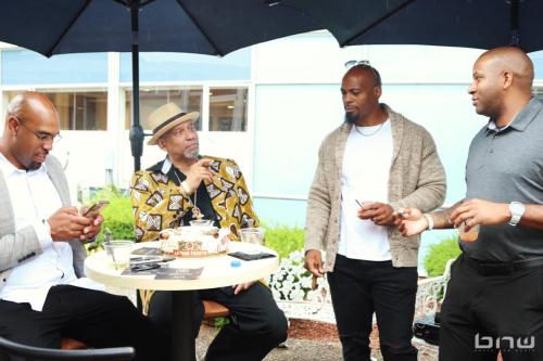 Attendees and panelists in the Smoke and Sip courtyard at the 2024 BECO EXPO